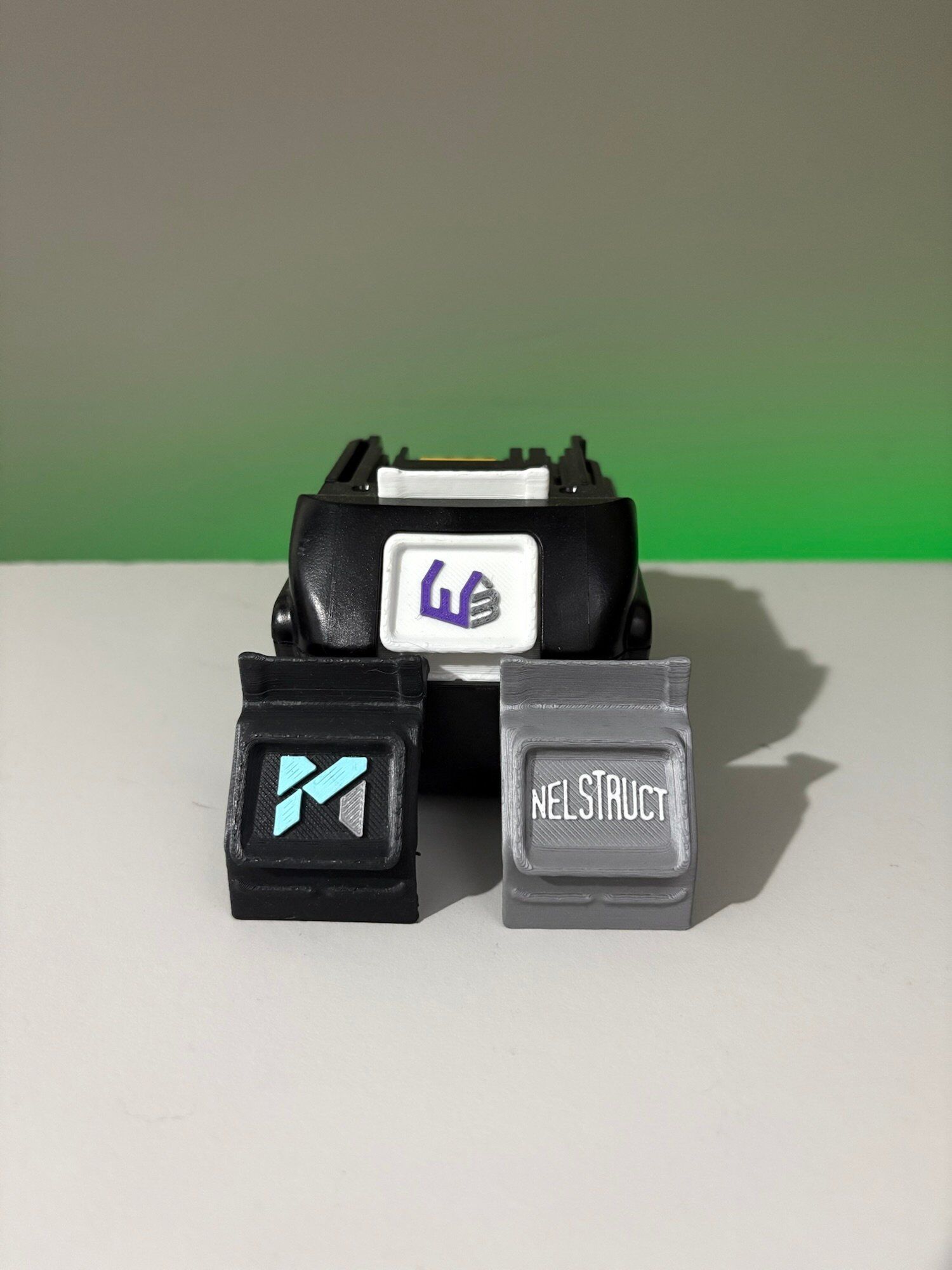 Construction company logo embossed on power tool battery anti-theft label